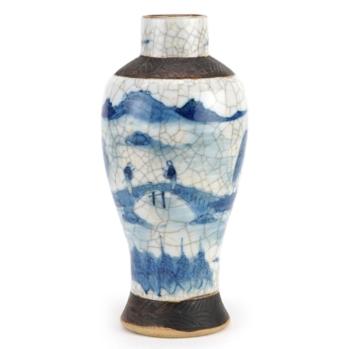 247 - A Chinese porcelain blue and white crackle glazed vase, early 20th century, bearing four character m... 