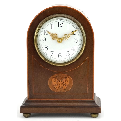 232 - An Edwardian mahogany cased mantle clock with inlaid decoration, the circular white enamelled dial o... 