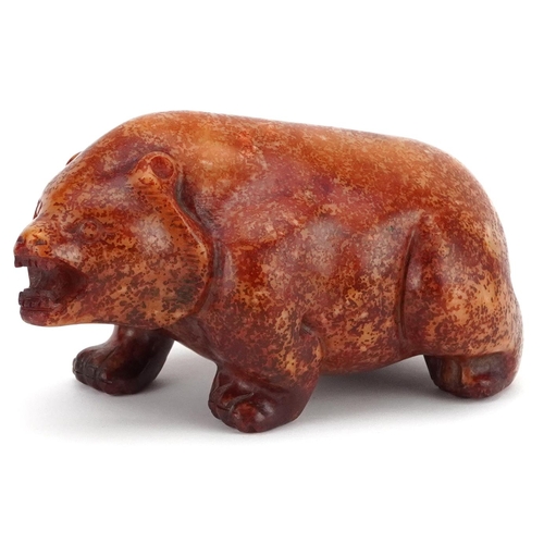 309 - A 20th century Chinese carved jade study of a bear, 14cm in length, 1004g.