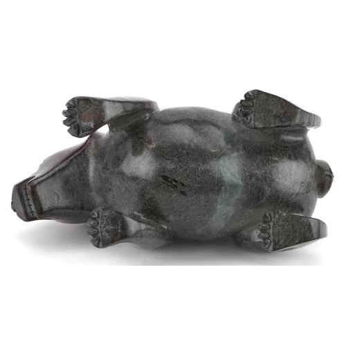 347 - A 20th century Chinese carved jade study of a bear, 13cm in length, 631.0g.