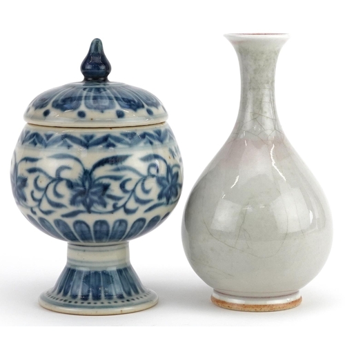 297 - A Chinese porcelain blue and white vase and cover and a cream glazed baluster vase, the largest 16cm... 