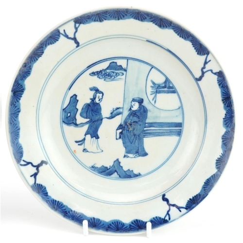 202 - Two Chinese porcelain blue and white plates hand painted with figures and a bird of paradise, the la... 