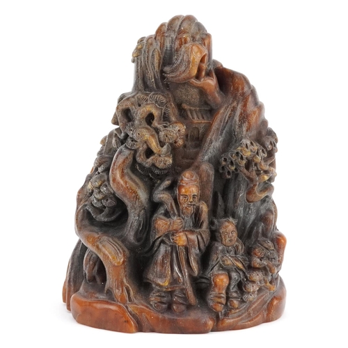 346 - A 20th century Chinese carved horn study of figures before mountains, 18cm high, 1243g.