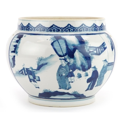 74 - A Chinese porcelain blue and white jardinière hand painted with figures in a landscape, double blue ... 