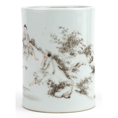 38 - A Chinese porcelain brush pot hand painted with figures seated in a landscape, six figure character ... 