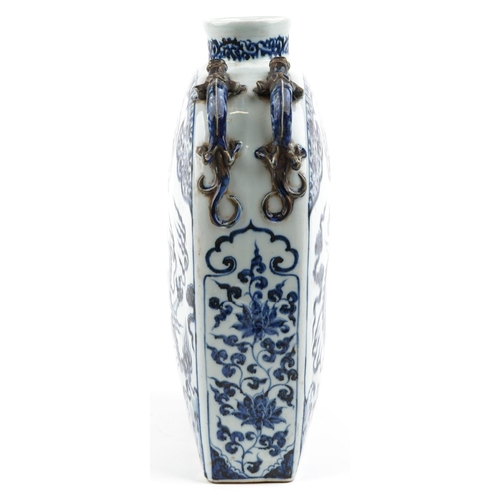 137 - A large Chinese stoneware blue and white vase having dragon handles, hand painted with a dragon and ... 