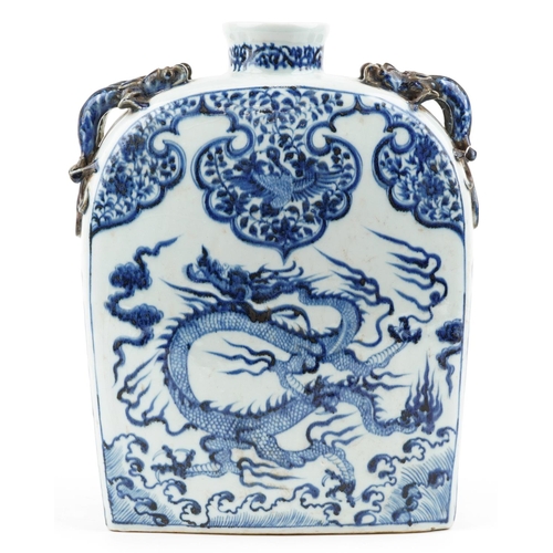 137 - A large Chinese stoneware blue and white vase having dragon handles, hand painted with a dragon and ... 