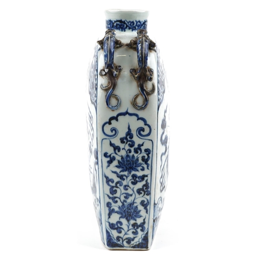 137 - A large Chinese stoneware blue and white vase having dragon handles, hand painted with a dragon and ... 