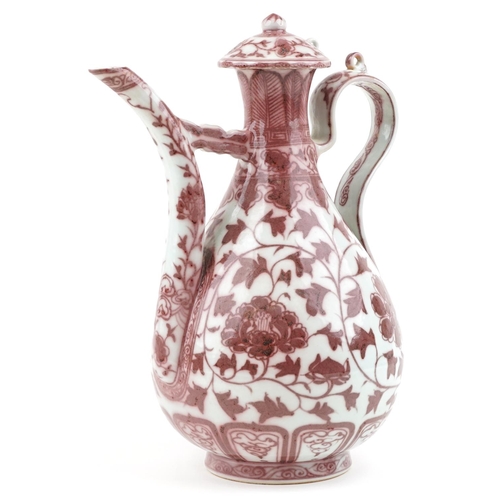 142 - A 20th century Chinese porcelain ewer hand painted in iron red with foliage and vines, 35cm high.