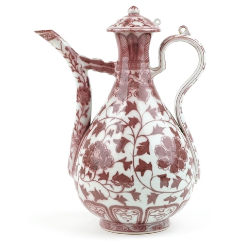 142 - A 20th century Chinese porcelain ewer hand painted in iron red with foliage and vines, 35cm high.