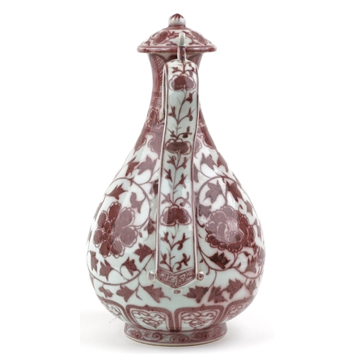 142 - A 20th century Chinese porcelain ewer hand painted in iron red with foliage and vines, 35cm high.