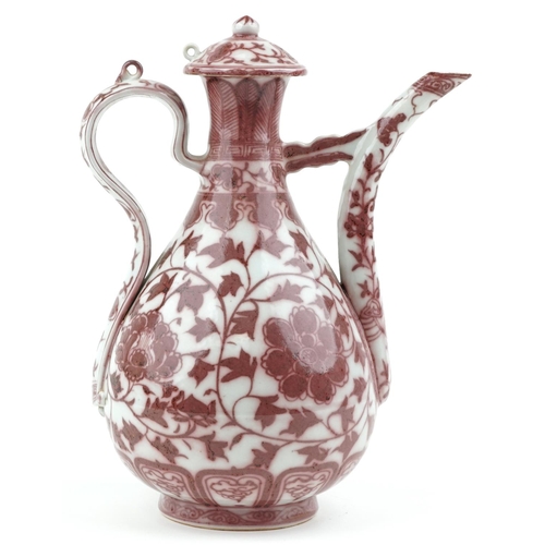 142 - A 20th century Chinese porcelain ewer hand painted in iron red with foliage and vines, 35cm high.