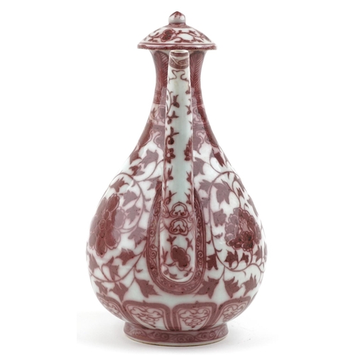 142 - A 20th century Chinese porcelain ewer hand painted in iron red with foliage and vines, 35cm high.