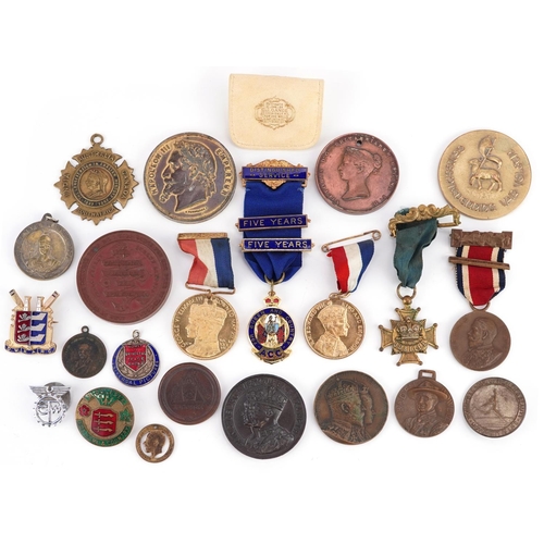 2262 - A collection of antique and later commemorative medallions and sporting medallions including St. Pau... 