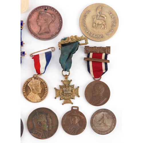 2262 - A collection of antique and later commemorative medallions and sporting medallions including St. Pau... 