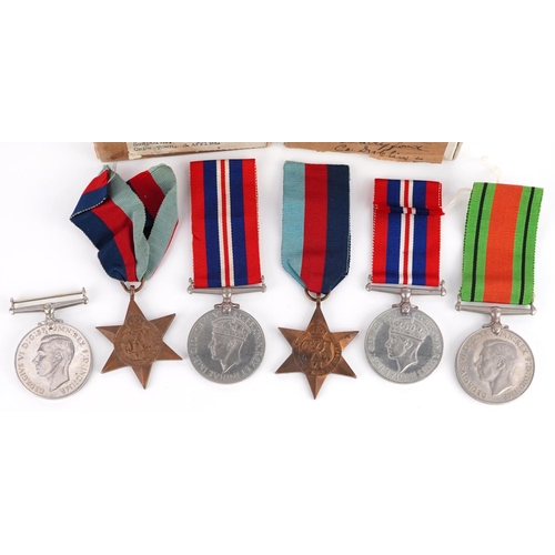 2399 - Two British military World War II medal trios with two boxes of issue addressed to C F Kirby and P S... 