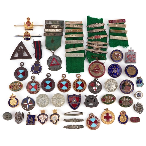 2254 - A collection of antique and later badges and jewels, some enamelled, including For Loyal Service bad... 