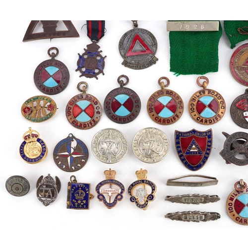 2254 - A collection of antique and later badges and jewels, some enamelled, including For Loyal Service bad... 