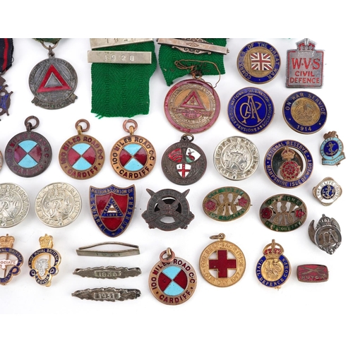 2254 - A collection of antique and later badges and jewels, some enamelled, including For Loyal Service bad... 