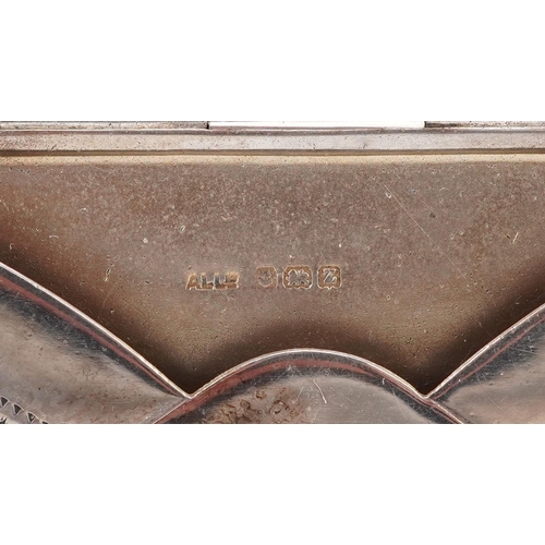 546 - Adie & Lovekin Ltd., a George V silver card case in the form of an envelope engraved with foliage, B... 