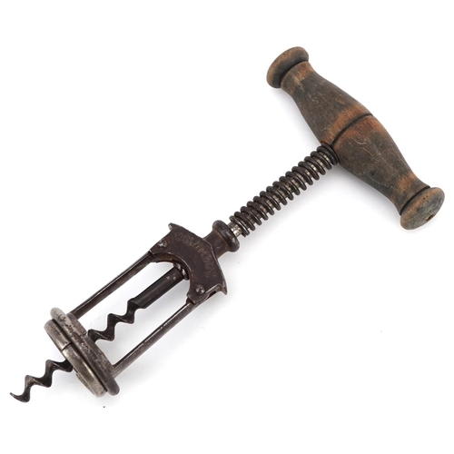  A 19th century German split frame Columbus corkscrew stamped Fruher D.R.P70879.