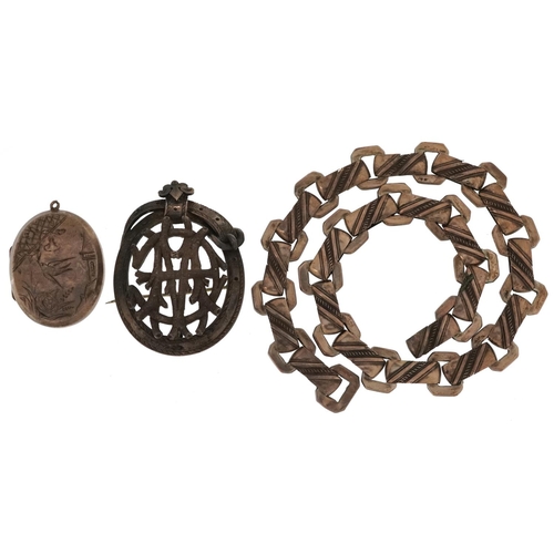 3771 - A Victorian aesthetic unmarked silver brooch together with an engraved locket and necklace, total we... 