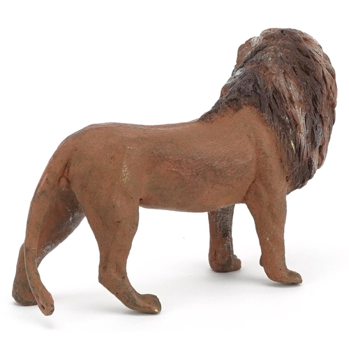 1242 - After Franz Xaver Bergmann, a cold painted bronze study of a lion, 9.5cm in length.