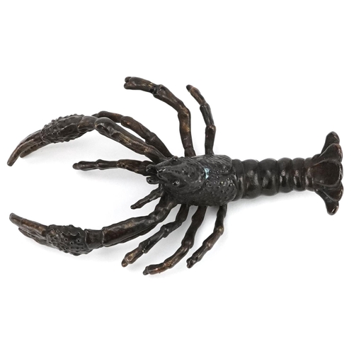 209 - A Japanese patinated bronze study of a crayfish, 9.5cm in length