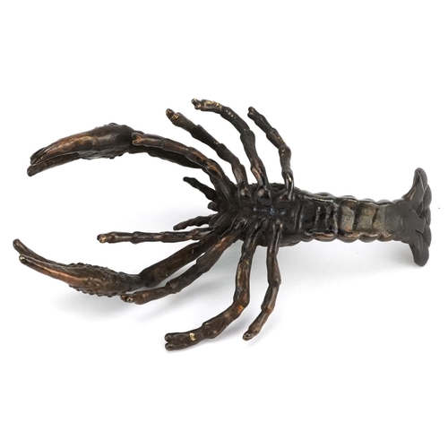 209 - A Japanese patinated bronze study of a crayfish, 9.5cm in length