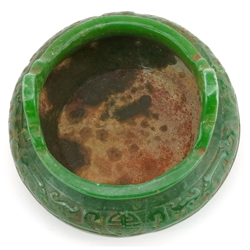 100 - A Chinese jade style censer with twin handles, 14cm in diameter.