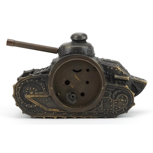 2480 - A novelty bronzed clock in the form of a military tank, 16cm in length.