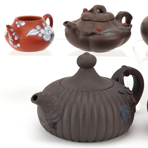 146 - A group of six Chinese Yixing stoneware teapots, 20th century, the largest 11cm high.