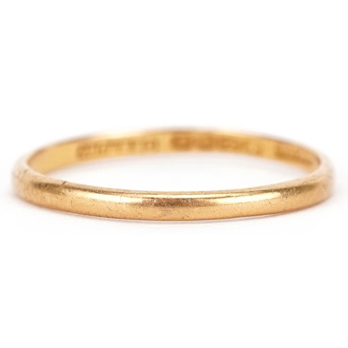 3065 - A 22ct gold wedding band, size Q, 1.5g.