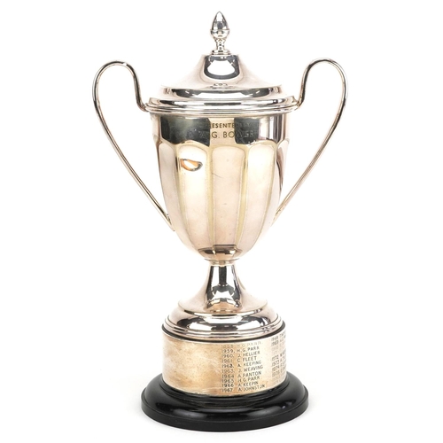 2300 - A golfing interest silver plated twin handled trophy and cover on stand for The Creed Golfing Societ... 