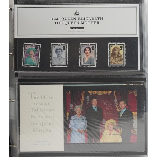 2233 - British Presentation packs of stamps housed in four red albums numbered 5-8