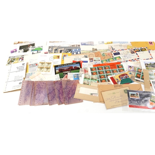 2222 - A quantity of British and Commonwealth stamps including presentation packs and loose stamps, predomi... 