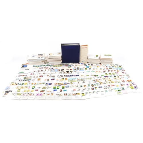 2230 - A large quantity of first day covers and stamp booklets, some with stamps, including presentation pa... 