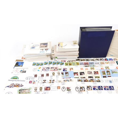 2230 - A large quantity of first day covers and stamp booklets, some with stamps, including presentation pa... 