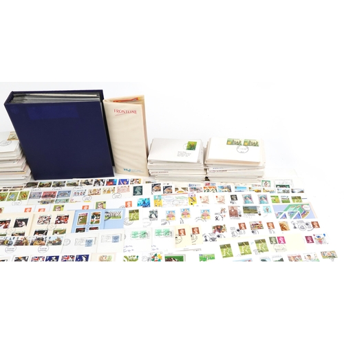 2230 - A large quantity of first day covers and stamp booklets, some with stamps, including presentation pa... 