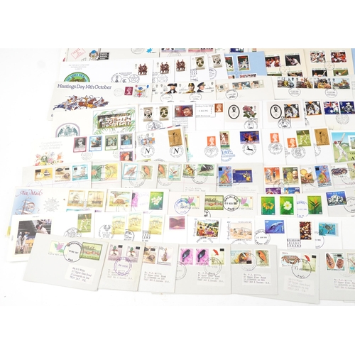 2230 - A large quantity of first day covers and stamp booklets, some with stamps, including presentation pa... 