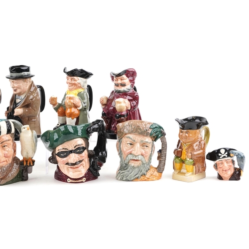 453 - A collection of eleven Royal Doulton character jugs including Dick Turpin, Winston Churchill and Rob... 