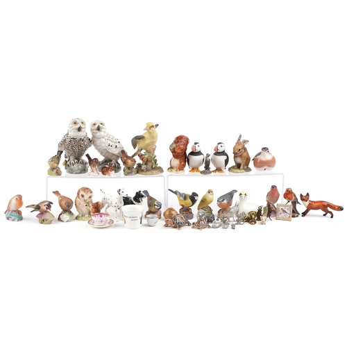 454 - A collection of 20th century pottery animals including examples by Beswick, Royal Worcestershire and... 