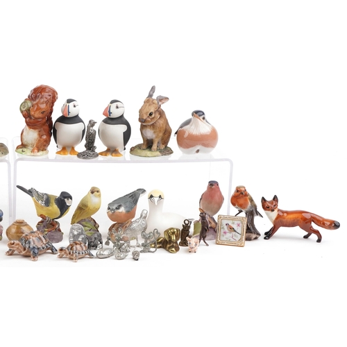 454 - A collection of 20th century pottery animals including examples by Beswick, Royal Worcestershire and... 