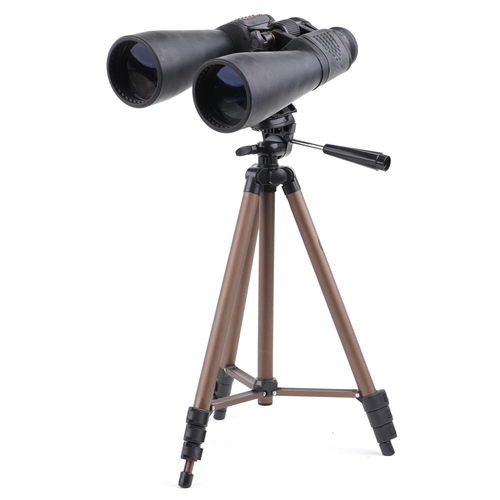 1003 - A pair of Skymaster Celestron 25 x 70 binoculars and tripod.