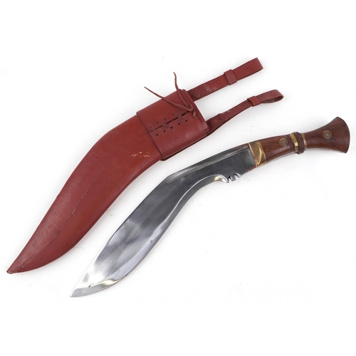 2534 - A Gurkha's kukri knife with leather sheath, 52cm in length.