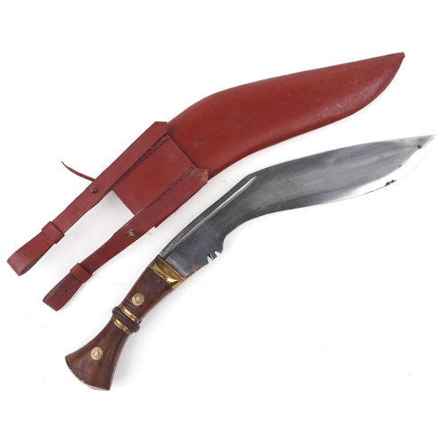 2534 - A Gurkha's kukri knife with leather sheath, 52cm in length.