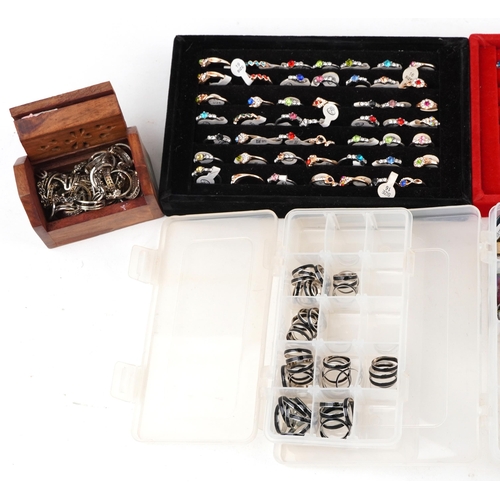 3806 - A large collection of costume jewellery rings and mood rings, mostly as new.