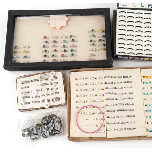 3812 - A large collection of costume jewellery rings and mood rings, mostly as new.