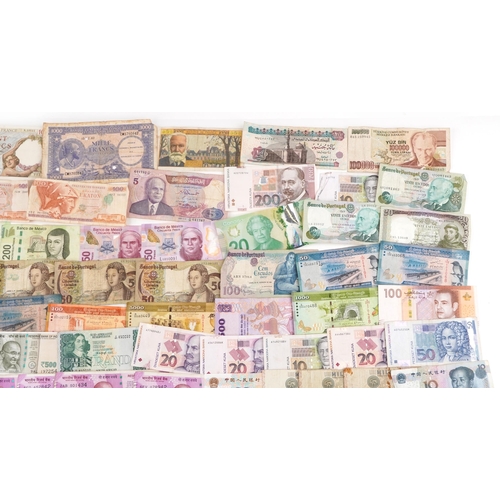 2216 - A quantity of vintage banknotes to include France, Mexico, Portugal, India and Sri Lanka.