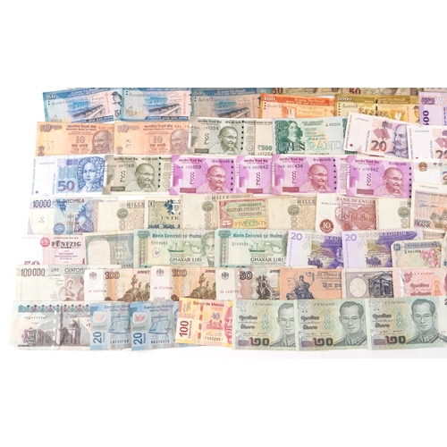 2216 - A quantity of vintage banknotes to include France, Mexico, Portugal, India and Sri Lanka.